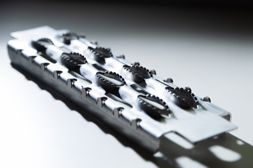 Pieza metálica tras proceso de punzonado